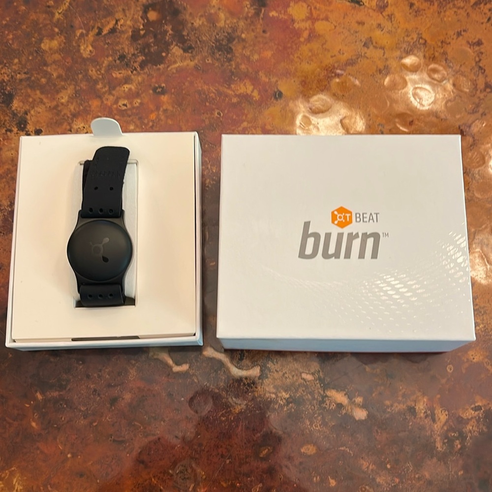 Very lightly used OT Beat Burn with box, manual, extra strap and charging cable